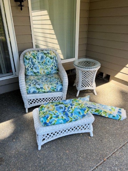 White Wicker Chair and Ottoman with Blue Floral Cushions, plus Side Table