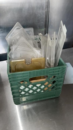 Crate of plastic lids