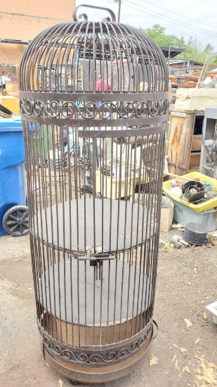 vintage wrought iron bird cage with wheels