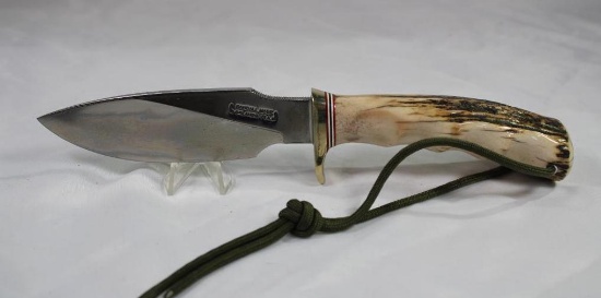 Randall Model 11 Alaskan skinner with 5.0 inch blade, brass hilt and stag antler handle. Original