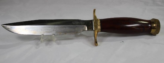 Randall Model 1 Bowie-style knife with 7.0 inch blade, brass hilt and pommel. Walnut burl handle.