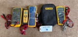 LOT OF 4 FLUKE MULTIMETERS AND TESTERS