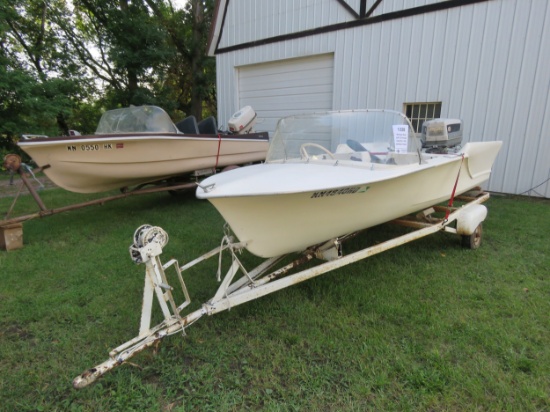 Vintage Boat with Evinrude Starlite 4 fifty outboard motor