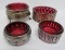 Four cranberry glass insert silver and silver plate framed salt dips