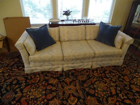 Sofa and Matching Love Seat w/ pillows. Sofa measures 86"L x 34" D x 26" H. Love seat - 6' L x 34"D