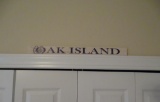 Wooden Oak Island sign