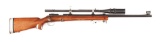(C) WINCHESTER MODEL 52 BOLT ACTION RIFLE.