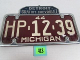 Excellent 1944 Michigan License Plate In Gratiot Chevrolet Frame Detroit, Mi