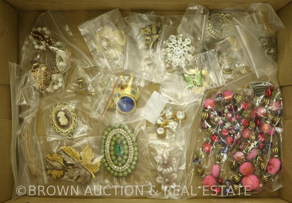Box lot of costume jewelry, assortment of necklaces, pins and bracelets