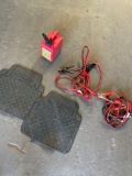 Car mats, booster cables, 1 gallon gas can. 4 pieces
