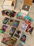 Hundreds of basketball, football, baseball cards