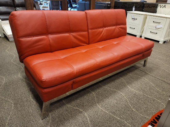 (R1) RED BONDED LEATHER MODERN CONVERTIBLE SOFA BED W/CHROME LEGS. HAS USB PLUG-INS ON THE SIDES AS