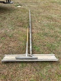 Concrete smoothing rake and extension