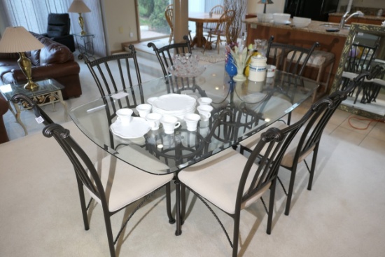 Glass topped table and set of six dining chairs