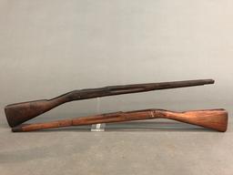 2 U.S. M1903 rifle stocks.