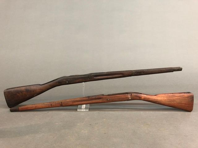 2 U.S. M1903 rifle stocks.