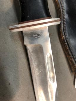 Buck knife with leather sheath
