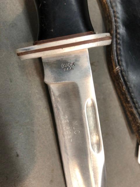 Buck knife with leather sheath