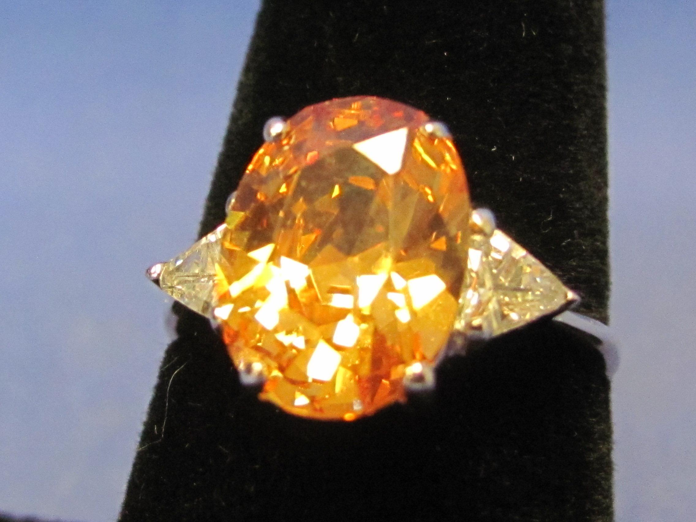2 Sterling Silver Rings w Light Orange Stones – Size 7.5 & 9.25 – Total weight is 7.9 grams