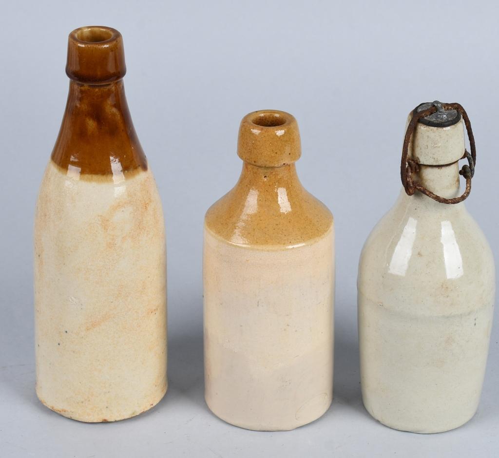 3- Stoneware Beer Bottles