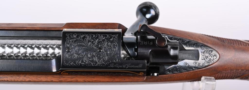 WINCHESTER MODEL 70 FEATHER WEIGHT 1 / 1000 RIFLE