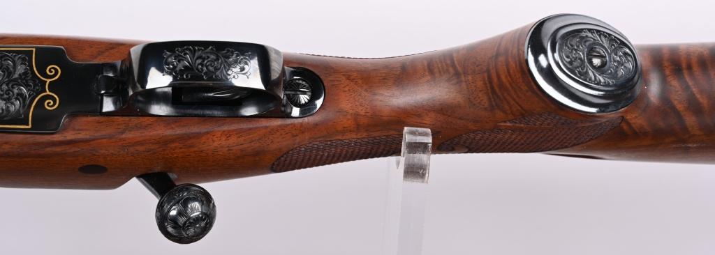 WINCHESTER MODEL 70 FEATHER WEIGHT 1 / 1000 RIFLE