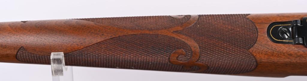 WINCHESTER MODEL 70 FEATHER WEIGHT 1 / 1000 RIFLE