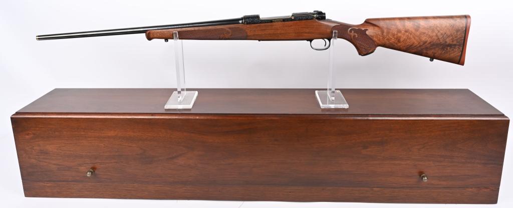 WINCHESTER MODEL 70 FEATHER WEIGHT 1 / 1000 RIFLE