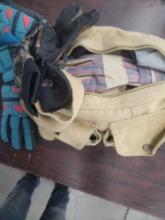 Canvas bag of assorted gloves