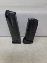 1-12 rnd S&W 9mm magazines & 1-unknown stainless