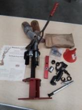 MEC 700 reloading press with powder bottles and parts