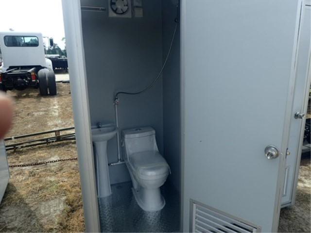 Double door portable toilet with shower