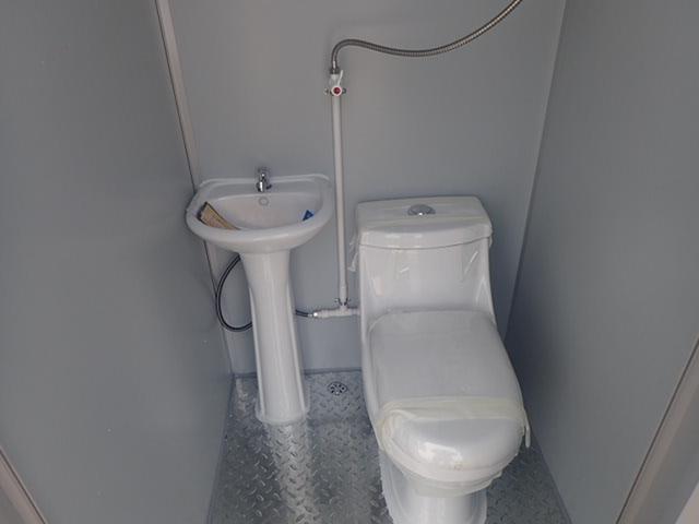 Double door portable toilet with shower