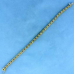 2.5ct Tw Ruby And Diamond Tennis Bracelet In 14k Yellow Gold