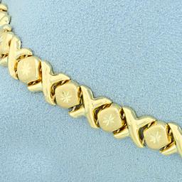 Diamond Cut X And O Link Bracelet In 14k Yellow Gold