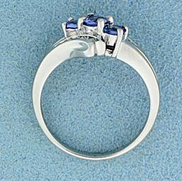 Over 1/2ct Tw Synthetic Tanzanite And Diamond Ring In 14k White Gold