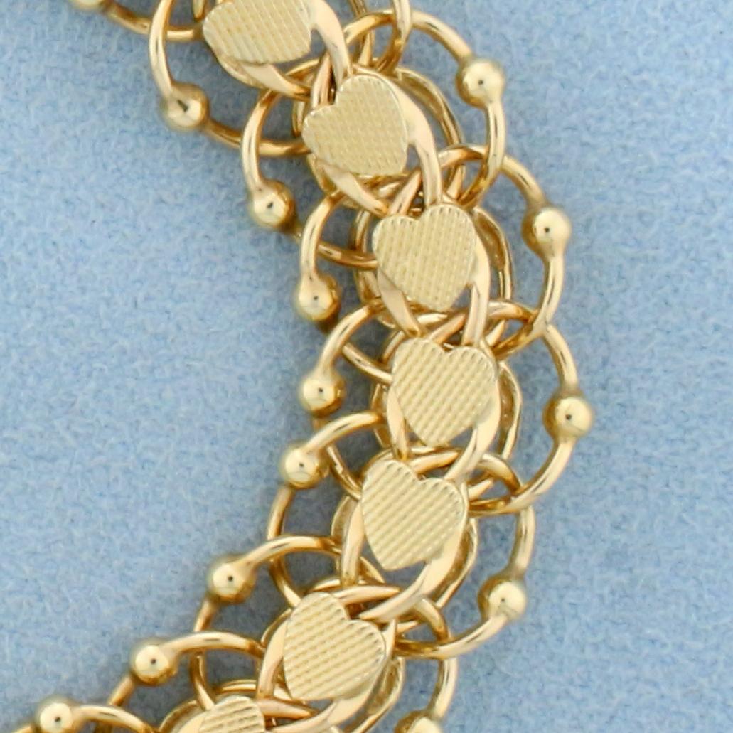 Designer Heart Link Charm Bracelet In 14k Yellow Gold
