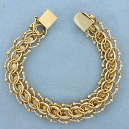 Designer Heart Link Charm Bracelet In 14k Yellow Gold