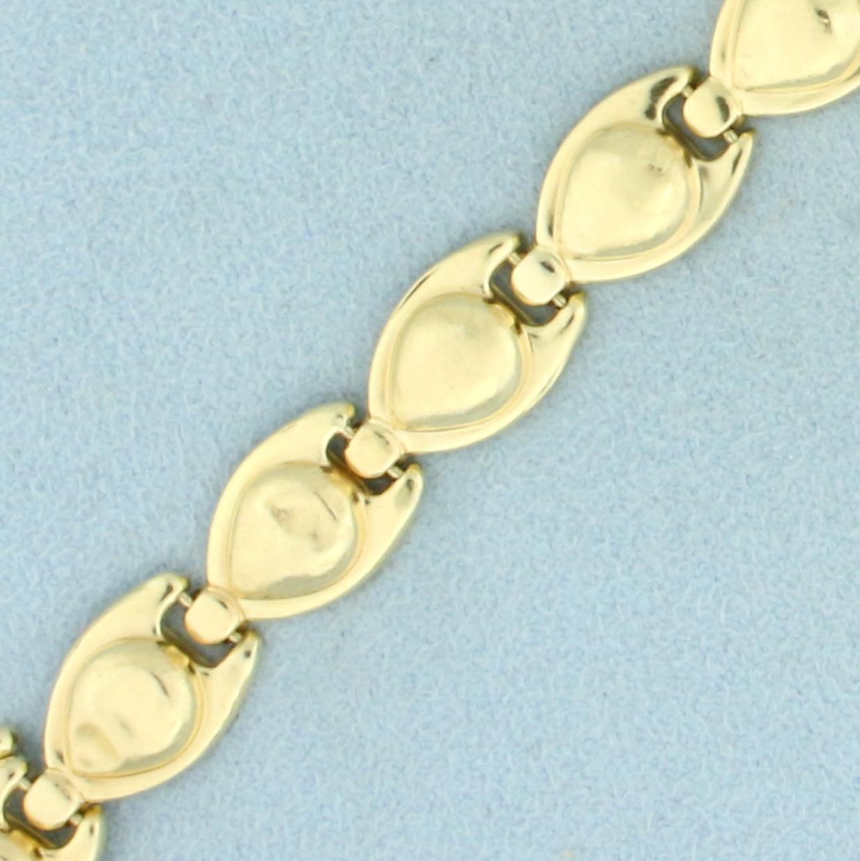 Abstract Designer Link Bracelet In 14k Yellow Gold