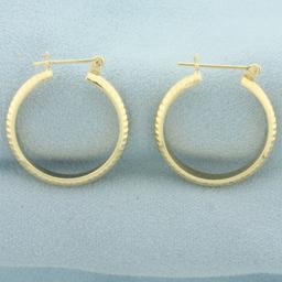 Diamond Cut Hoop Earrings In 14k Yellow Gold