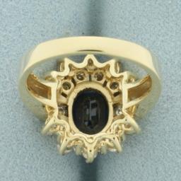 Sapphire And Diamond Flower Design Ring In 14k Yellow Gold