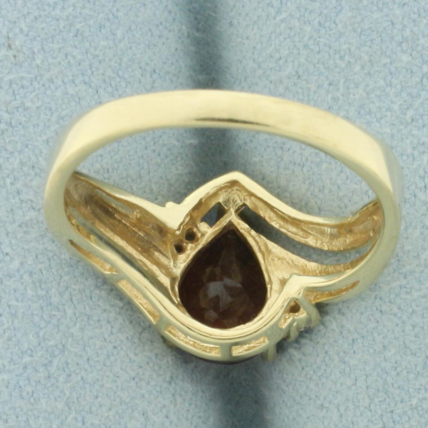 Pear Garnet And Diamond Ring In 14k Yellow Gold