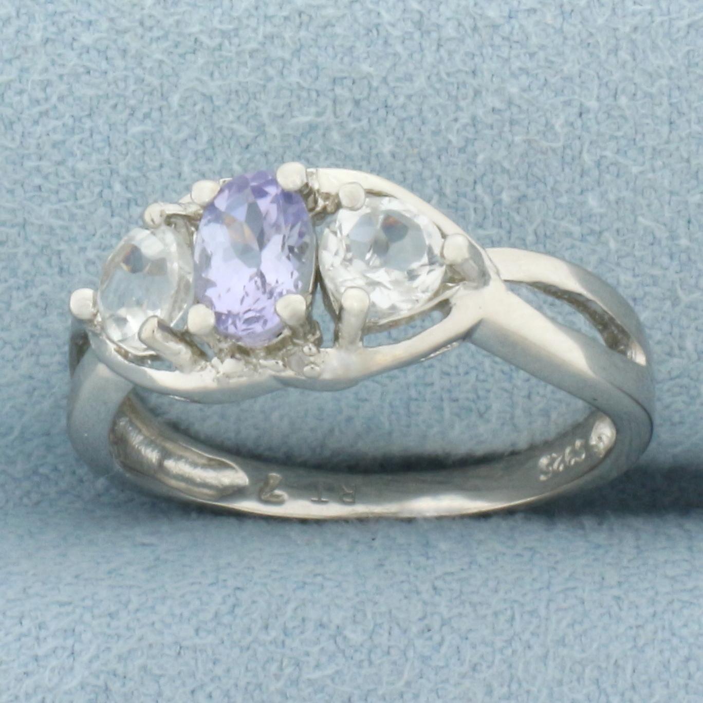 1ctw Tanzanite, White Topaz, And Diamond Ring In Platinum Over Sterling Silver