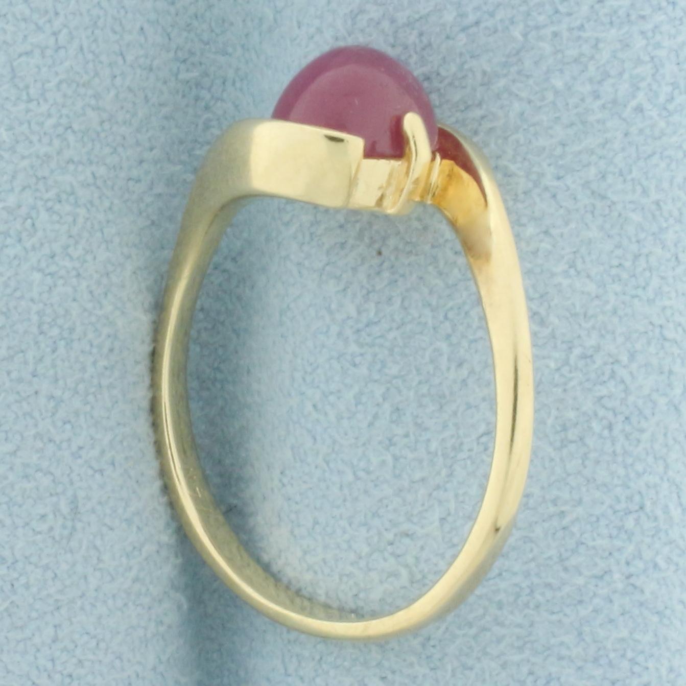 Natural Cabochon Ruby Bypass Ring In 14k Yellow Gold