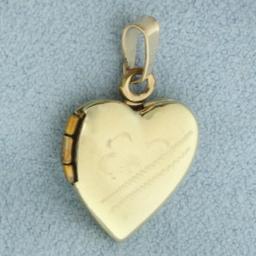 Flower Engraved Heart Locket Pendant In 10k Yellow Gold