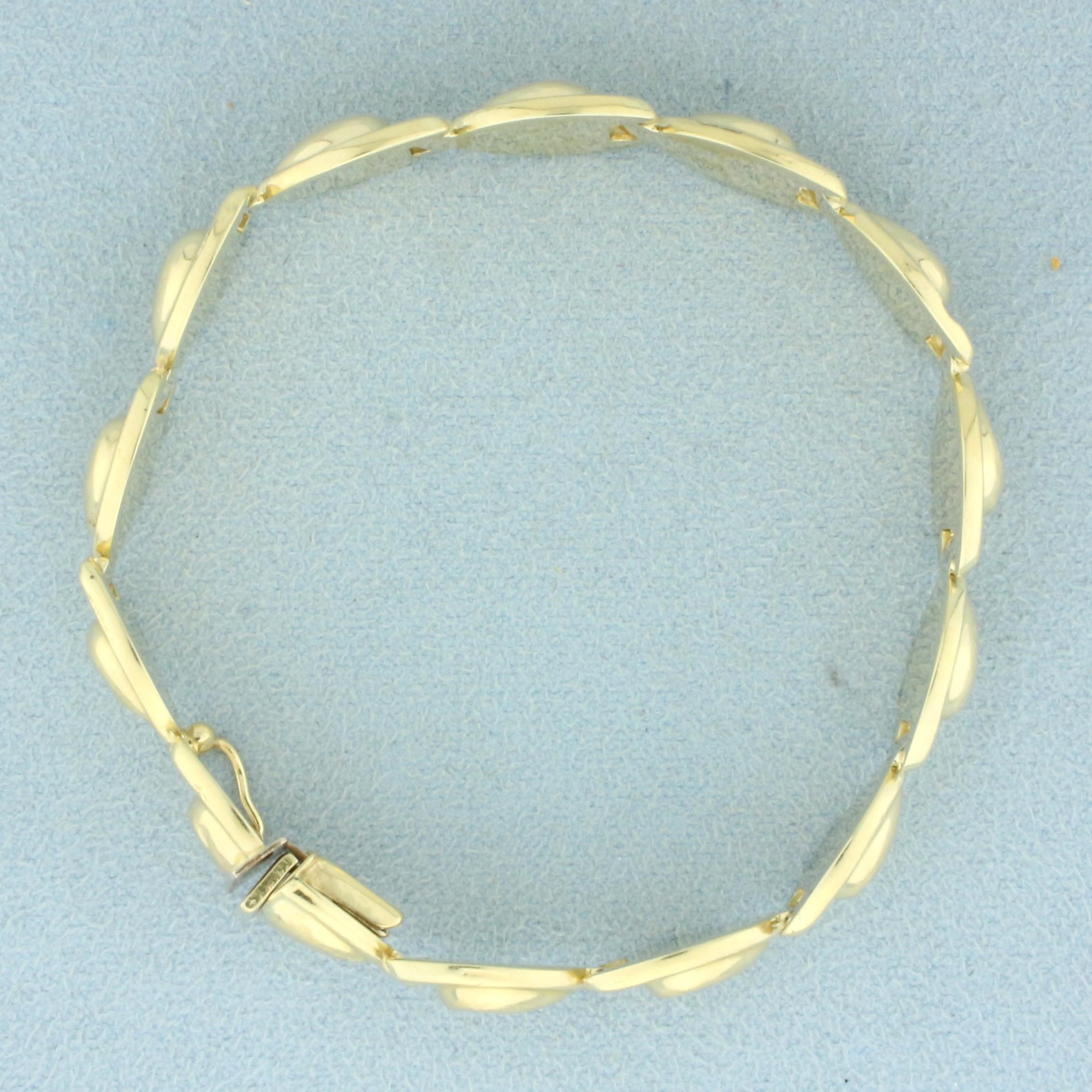 Abstract Designer Link Bracelet In 14k Yellow Gold