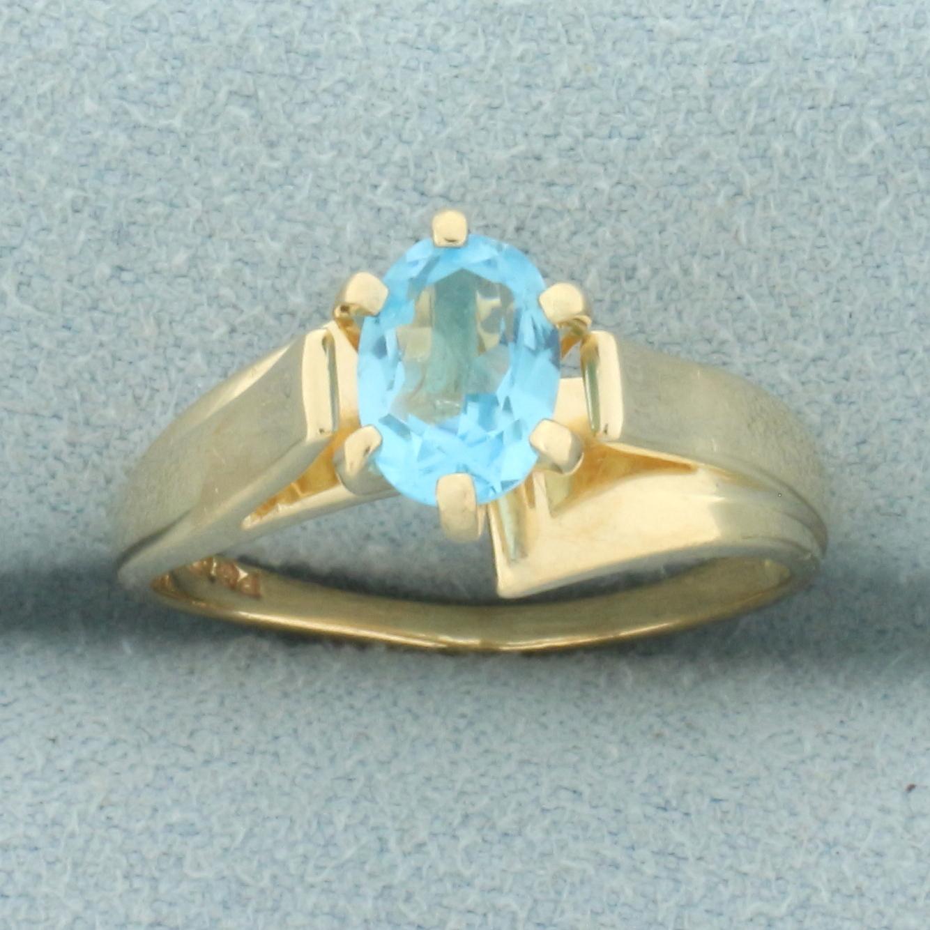 Blue Topaz Solitaire Ring In 14k Yellow Gold