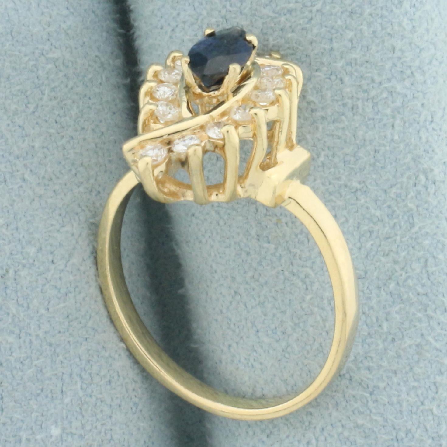 Marquise Sapphire And Diamond Ring In 14k Yellow Gold
