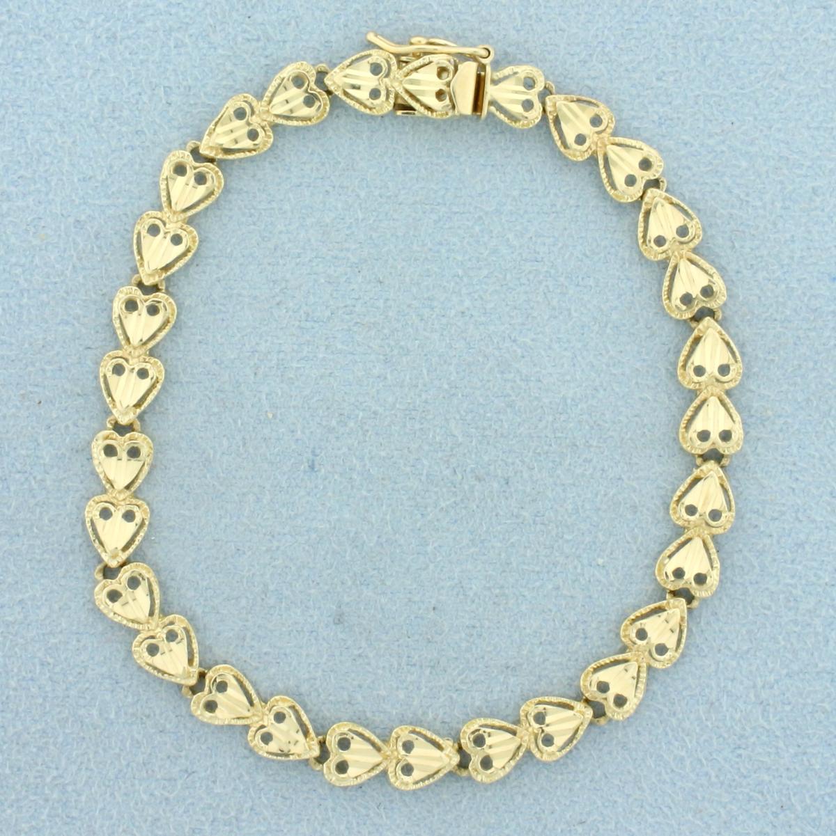 6 1/2 Inch Heart Link Diamond Cut Bracelet In 14k Yellow Gold