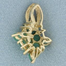 Emerald And Diamond Cluster Pendant In 14k Yellow Gold